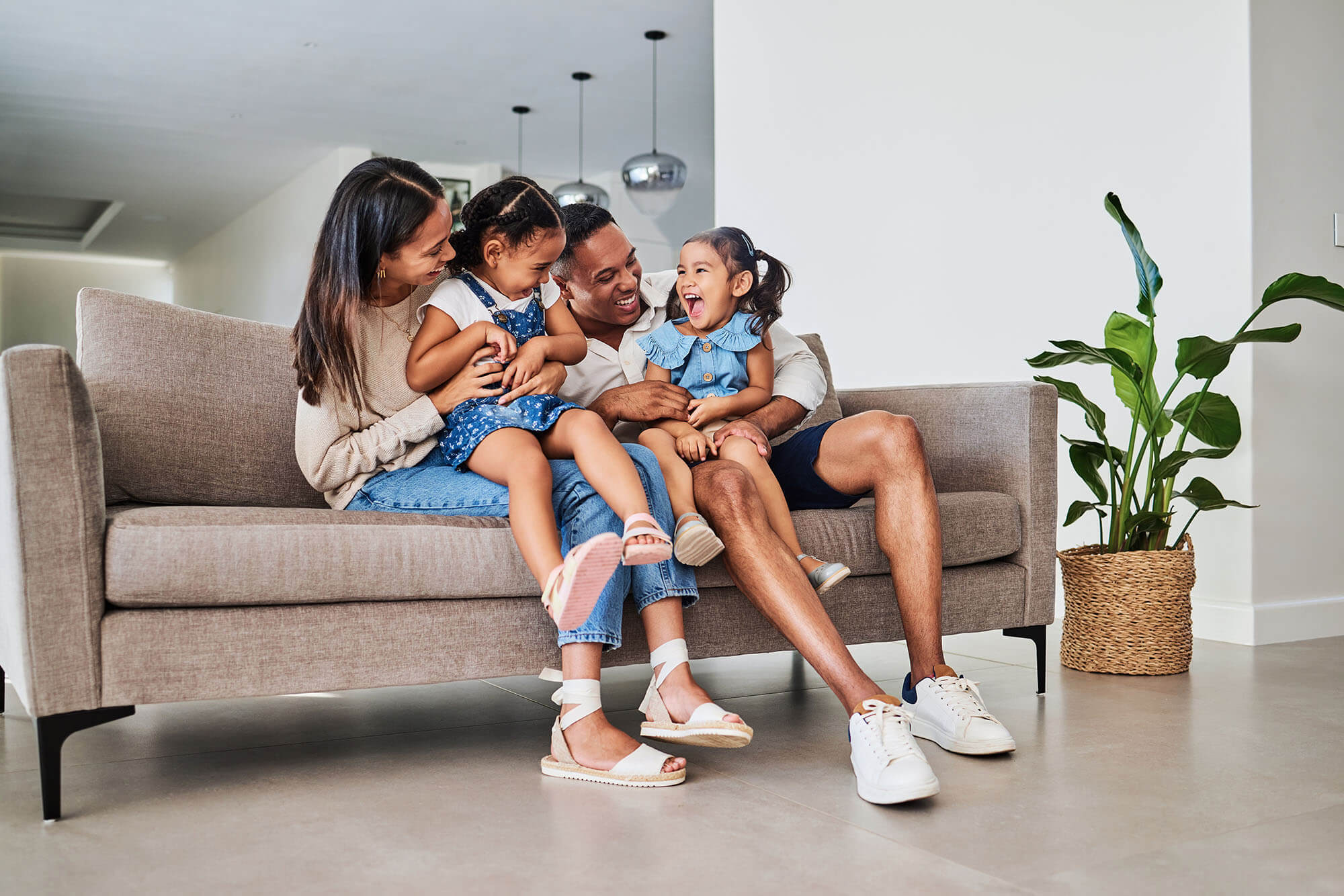 family sitting on the sofa